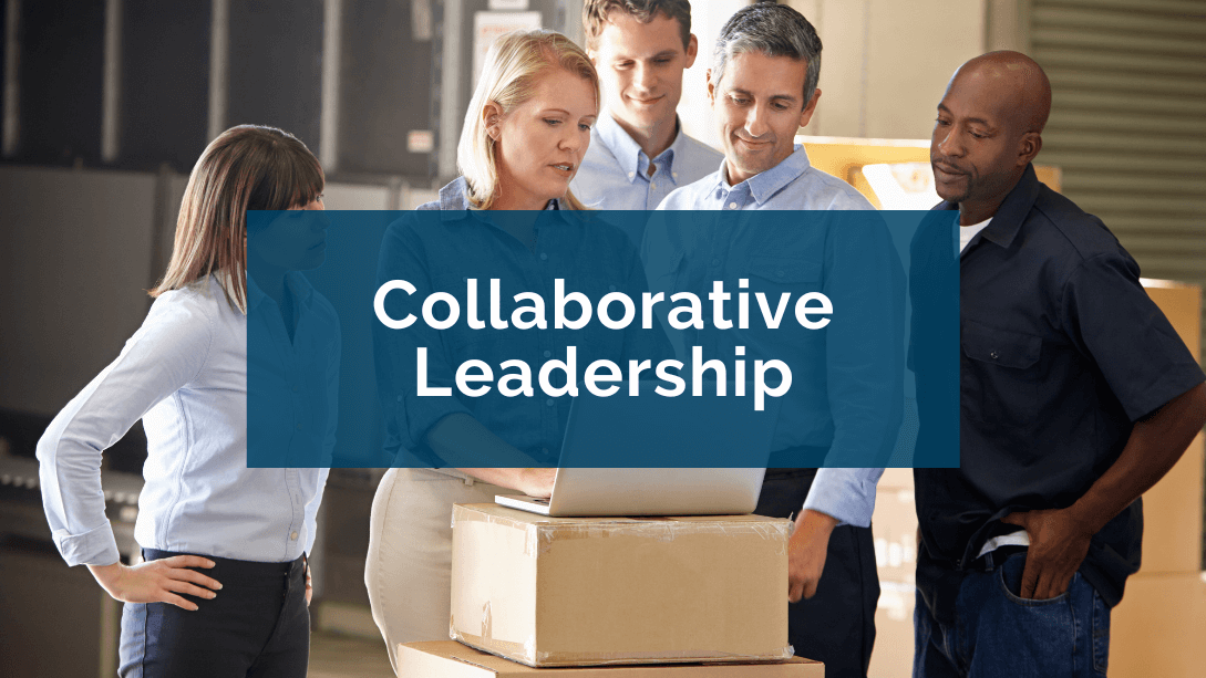 Four workers gathered around their manager, representing collaborative leadership