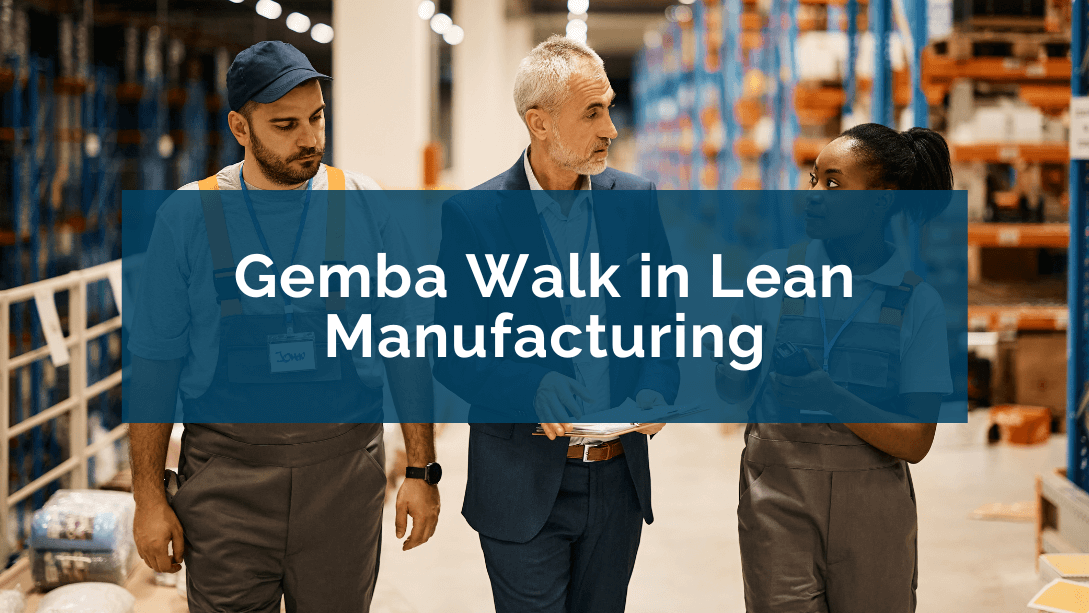 A manager and two workers walking in a warehouse, the manager looking at the worker on his left, listening to her